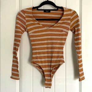 Never worn, Vici bodysuit.